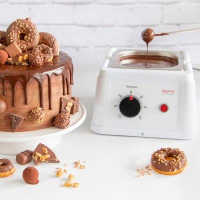 M�quina per fondre i temperar xocolata