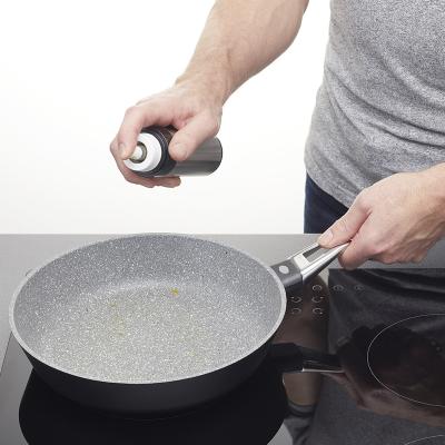 Spray amb bomba per a oli acer