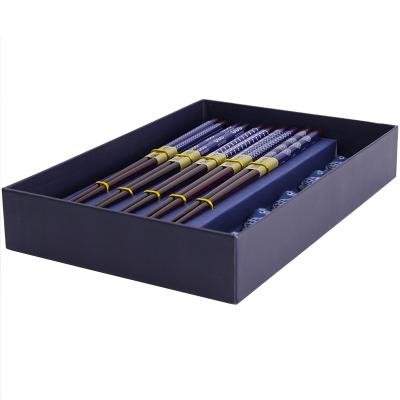 Set 5 parells bastonets amb 5 suports Peix blau