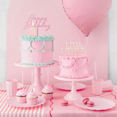 Set de 12 espelmes llargues rosa/daurat
