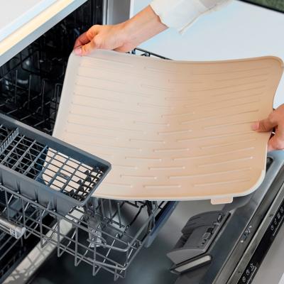 Escorreplats silicona amb sortida aigua soft beige