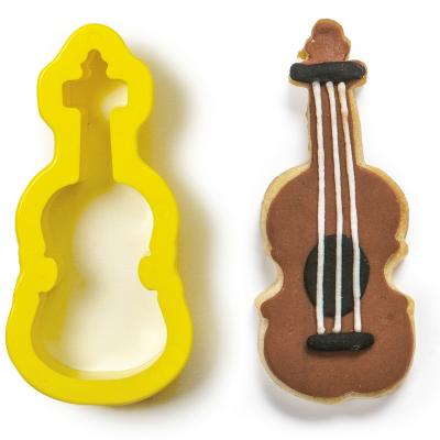 Set 2 cortadores galletas pl�stico Clave Sol Viol�