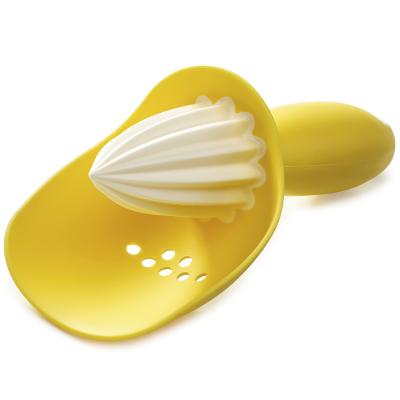 Exprimidor de mano para c�tricos Catcher