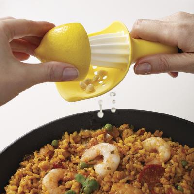 Exprimidor de mano para c�tricos Catcher