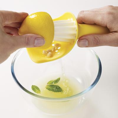 Exprimidor de mano para c�tricos Catcher