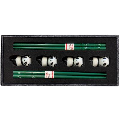 4 pares palillos con 4 soportes panda