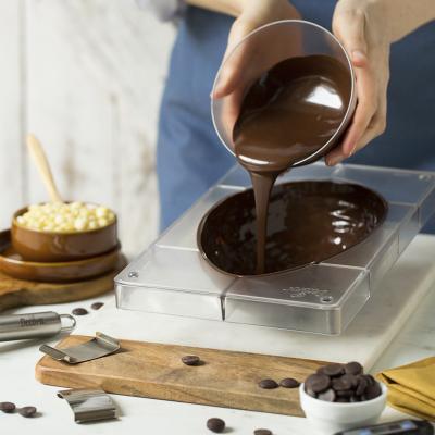 Molde policarbonato para chocolate Huevo rayas 350