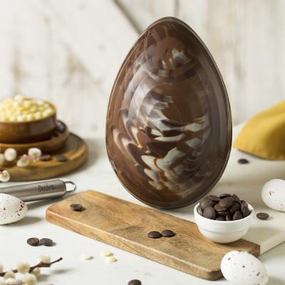 Molde policarbonato para chocolate Huevo rayas 350