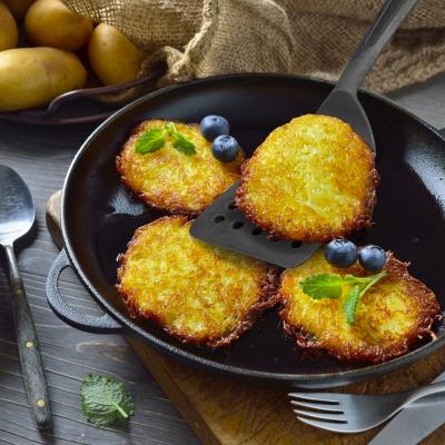 Esp�tula plana agujeros nylon 31 cm