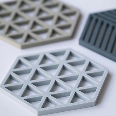 Salvamanteles trivet tri�ngulos