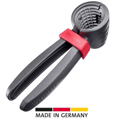 Cascanueces y descorchador champagne abrazadera