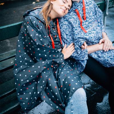 Impermeable plegable reflectante Puntos