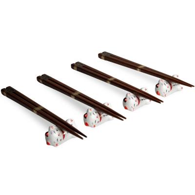 4 pares palillos con 4 soportes gato suerte
