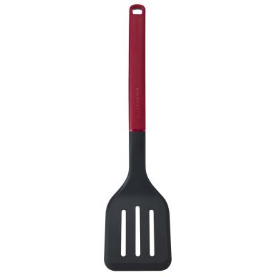 Esp�tula Turner ranurada nylon 34 cm rojo